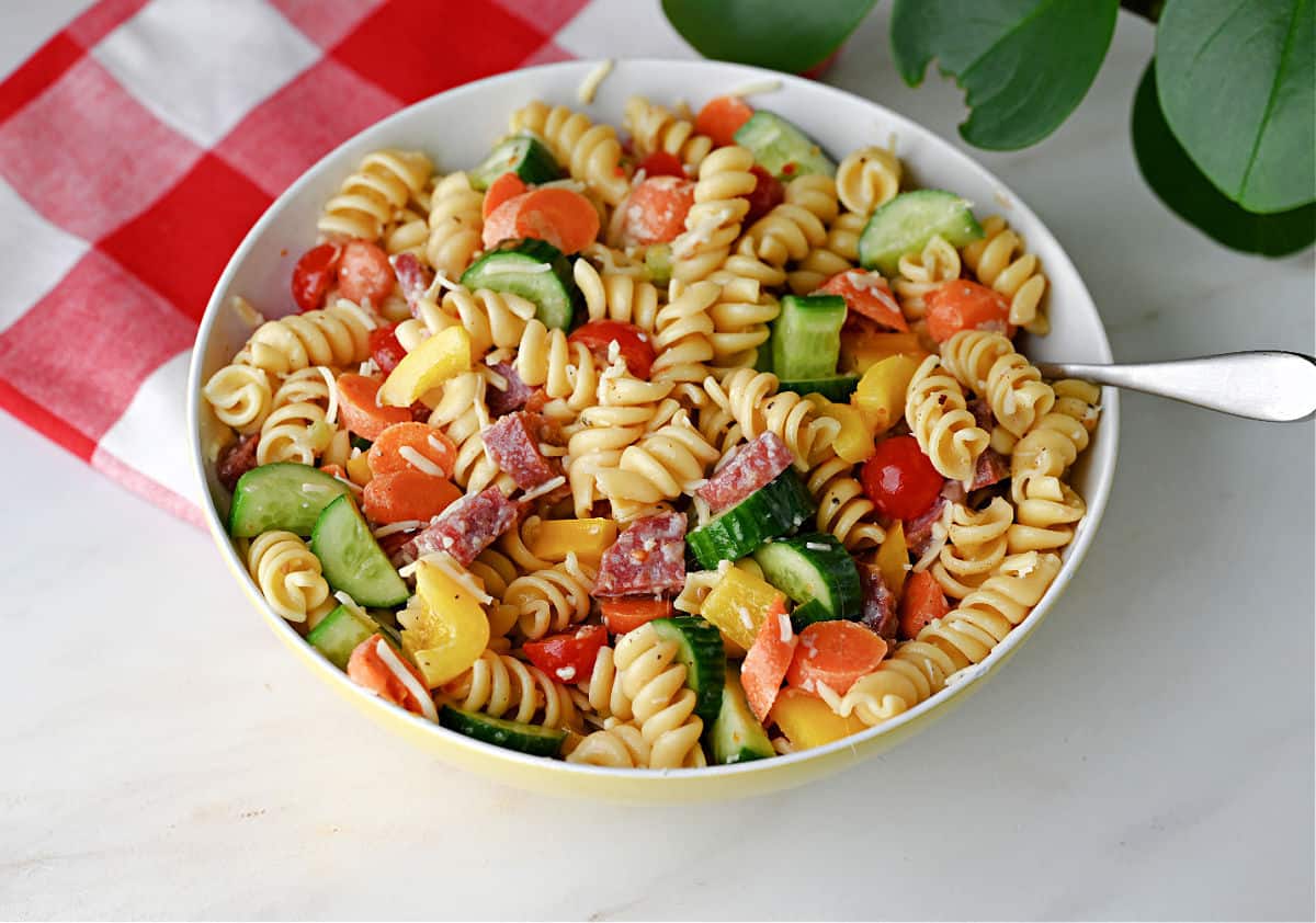 A serving bowl of easy and delicious pasta salad.