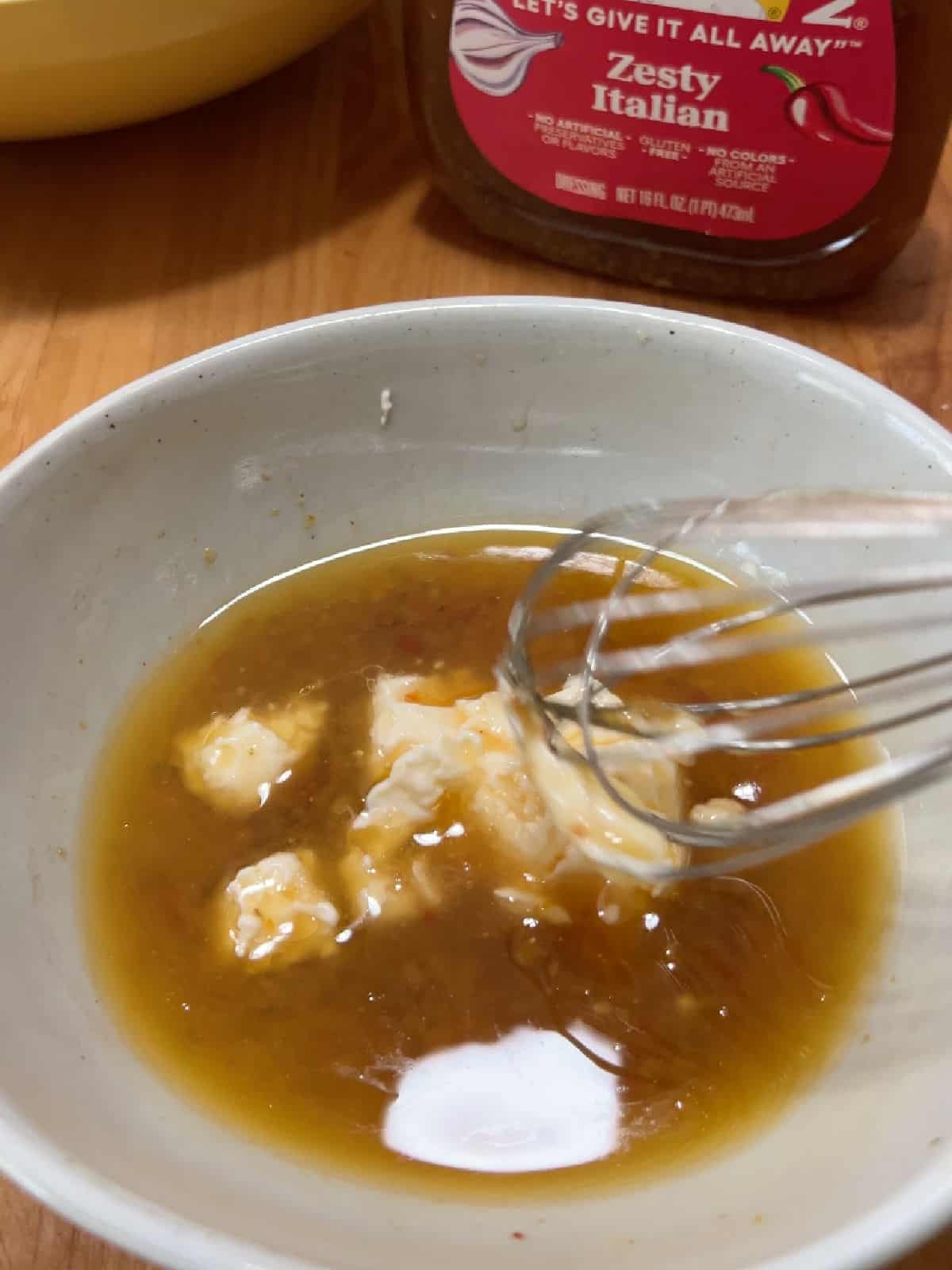 Mixing mayo and bottled Italian dressing.