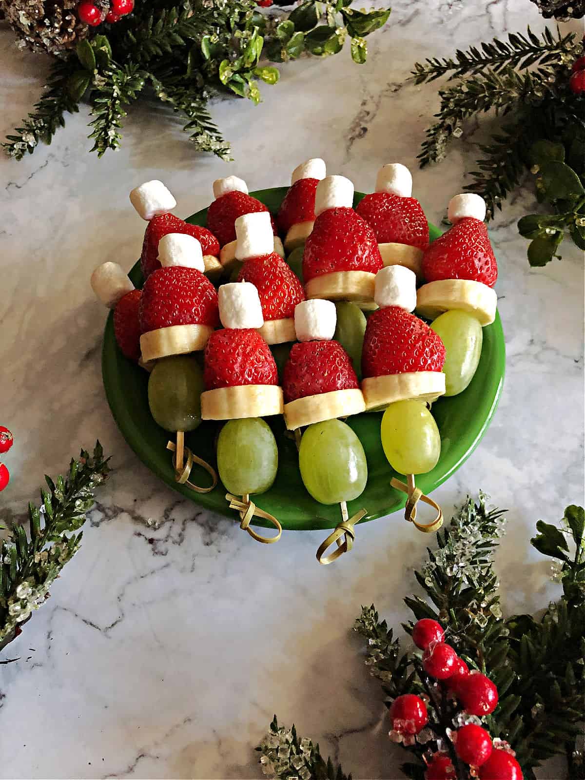 plate of grinch kabobs ready to eat.