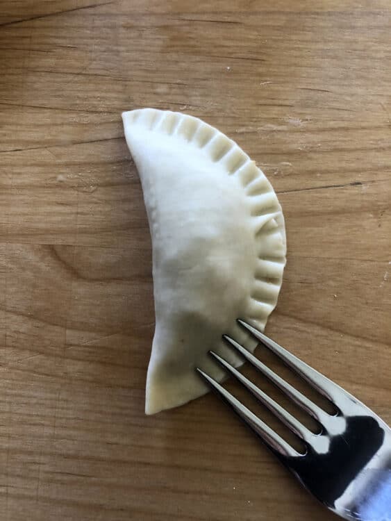  Sealing the Potsticker Chinese Dumpling using a fork