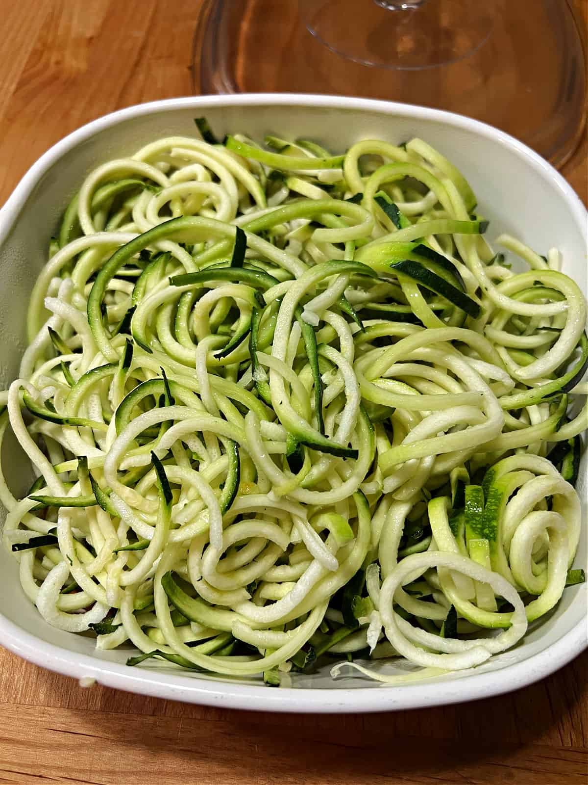 Fresh zoodles in a microwave safe dish.