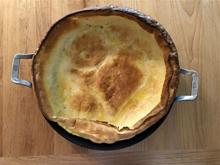 Baked Dutch Baby in skillet straight from oven