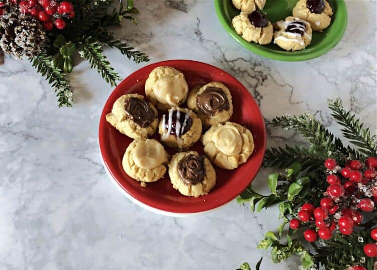 Assortment of Thumbprint cookies on a red plate