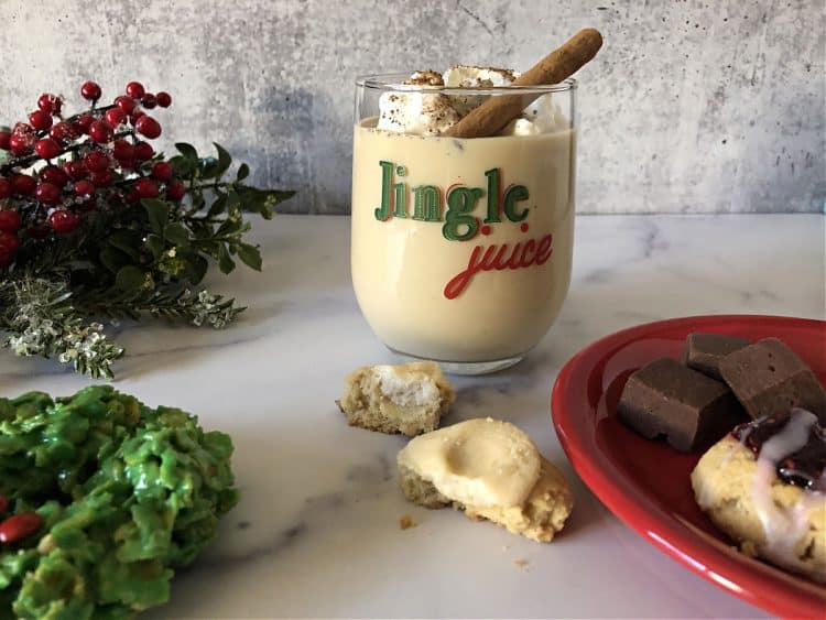 eggnog and baileys in a rocks galss that says Jingle Juice