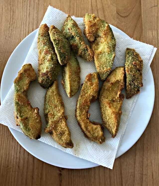 avocado fries on a paper towel lined plate