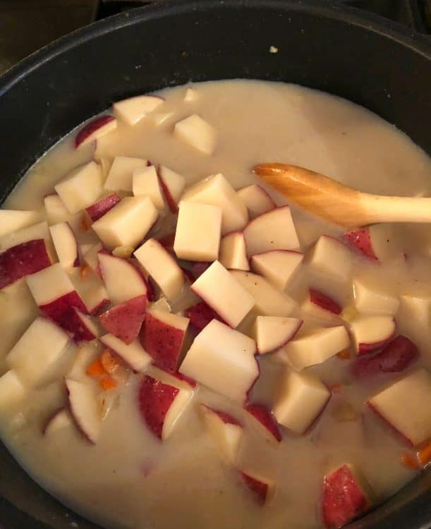 potatoes in liquid ready to cook