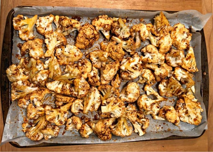 roasted and spiced cauliflower on a baking sheet