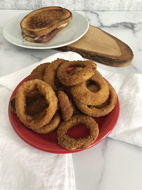 Air Fried Onion Rings on a small red plate