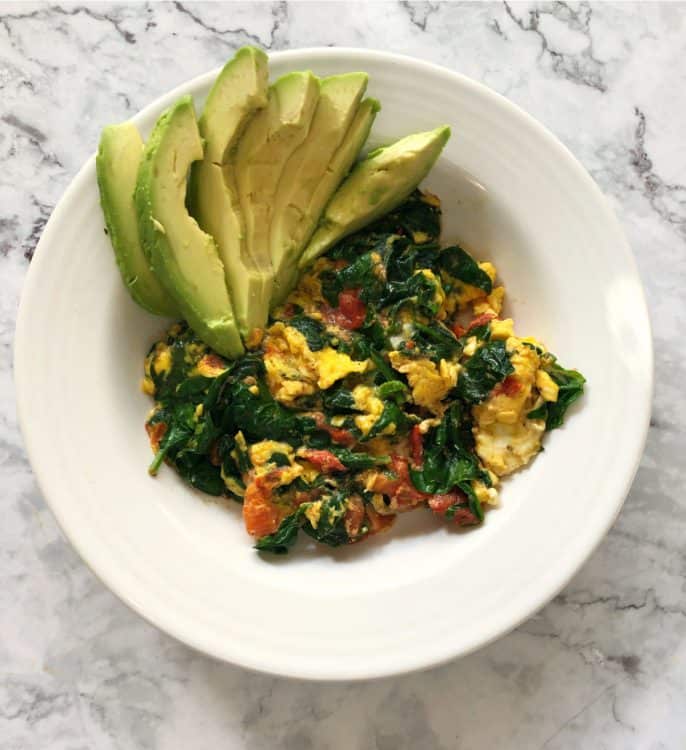 Eggs in a bowl with avocado