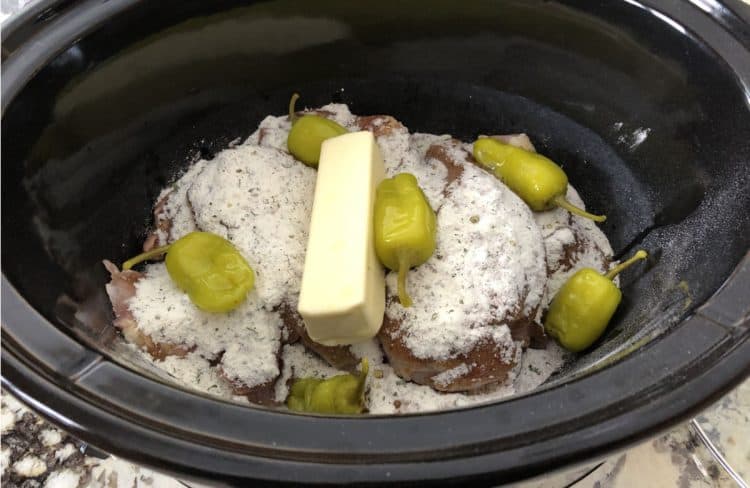 ingredients placed in crock pot