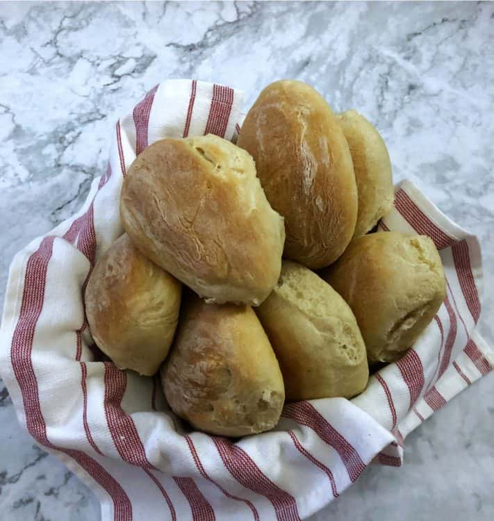 Sub rolls in a towel lined basket