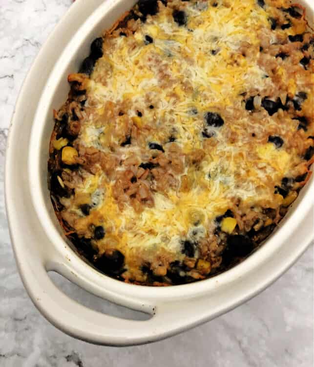 oval casserole dish with baked casserole inside