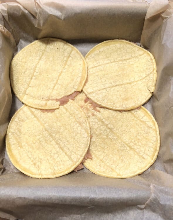 layer of tortillas in pan