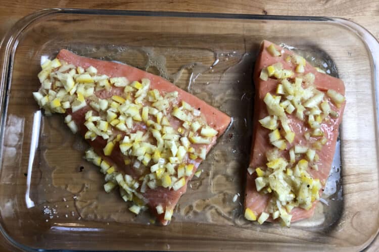 salmon in a 9x13 pan ready to bake