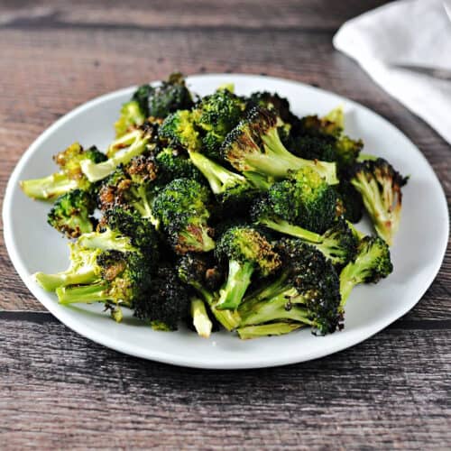 Air Fried broccoli on a white plate