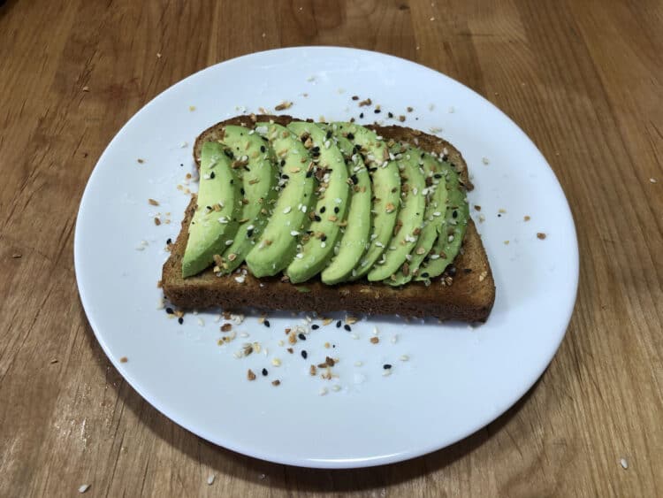 slices of avocado on a piece of toast with Everything but the Bagel seasoning