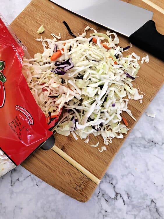 coleslaw mix on a cutting board