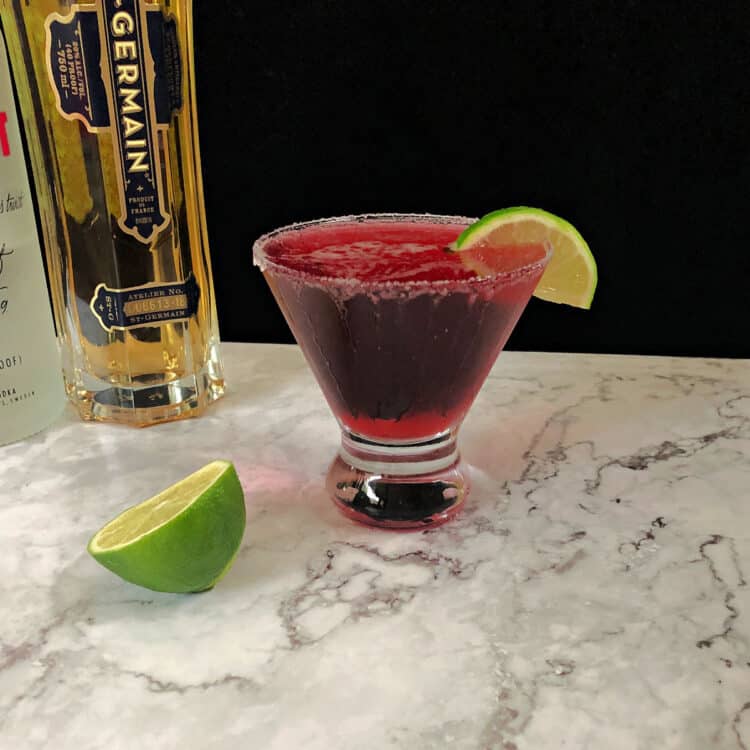 Cranberry Grapefruit Cocktail in a glass garnished with lime