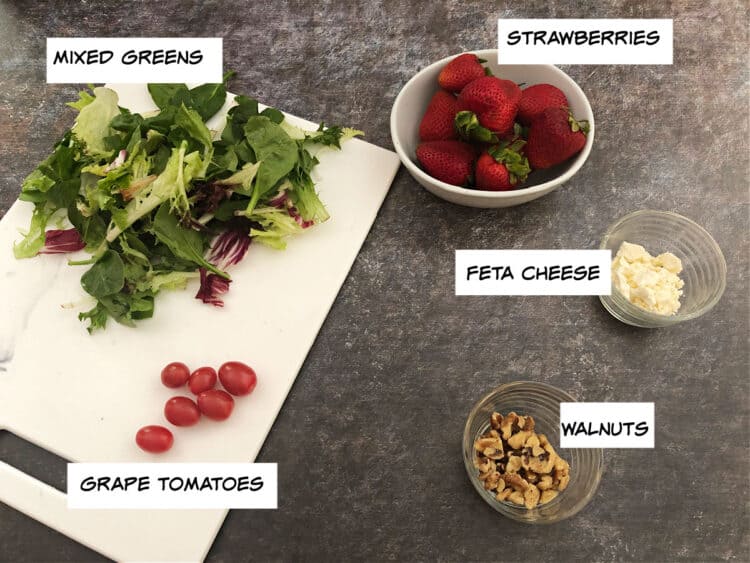 ingredients: greens, berries, feta, tomatoes, walnuts