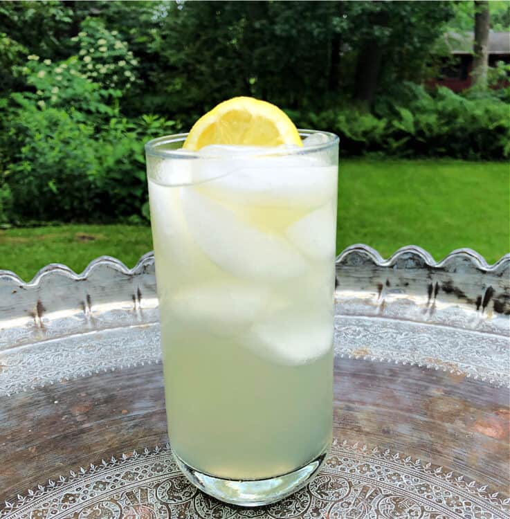 glass of lemonade on a table outdoors