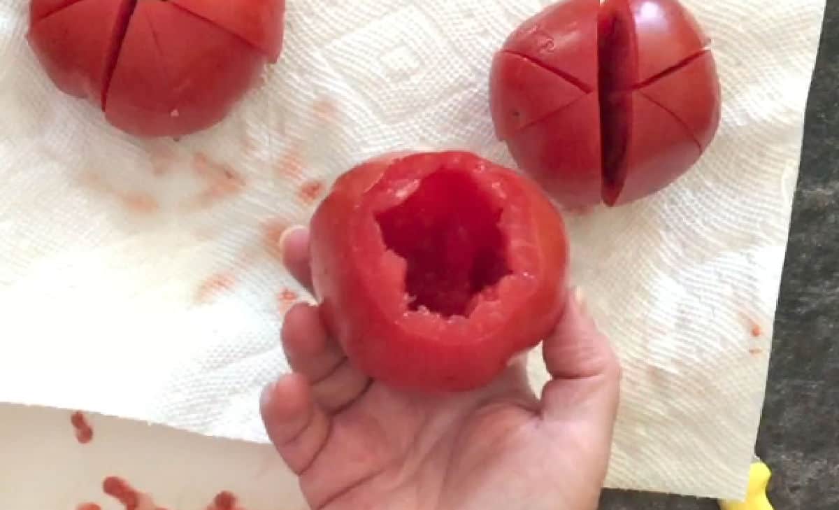 Tomato with center scooped out.