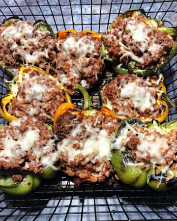 grilled stuffed peppers in a grill basket