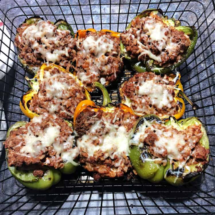 grilled stuffed peppers in a grill basket