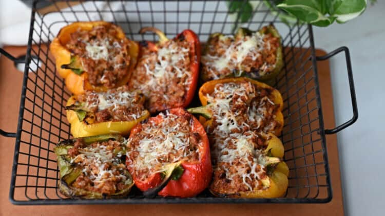 grilled stuffed peppers in a basket.