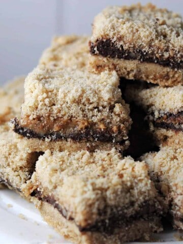 stck of chocolate caramel bars on a plate