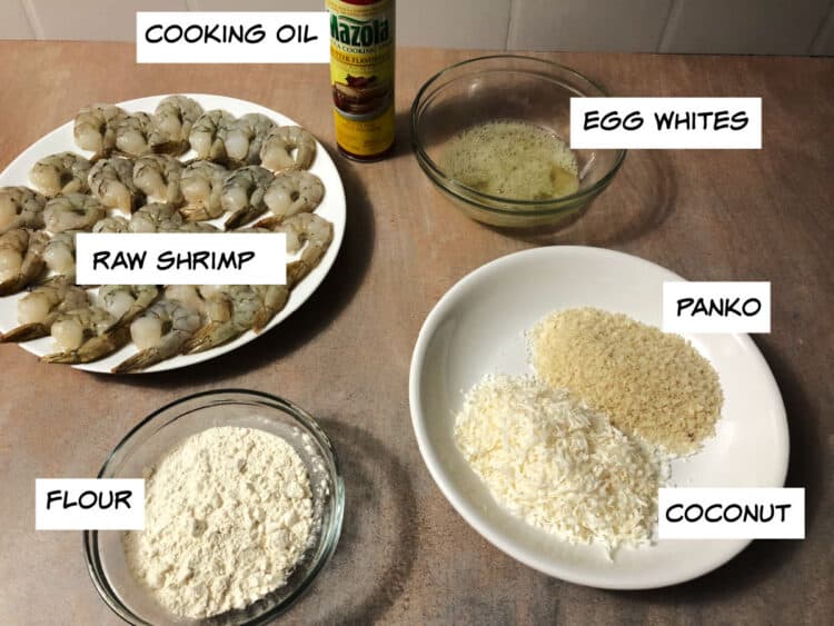 ingredients: shrimp, cooking oil spray, egg whites, panko, coconut, and flour