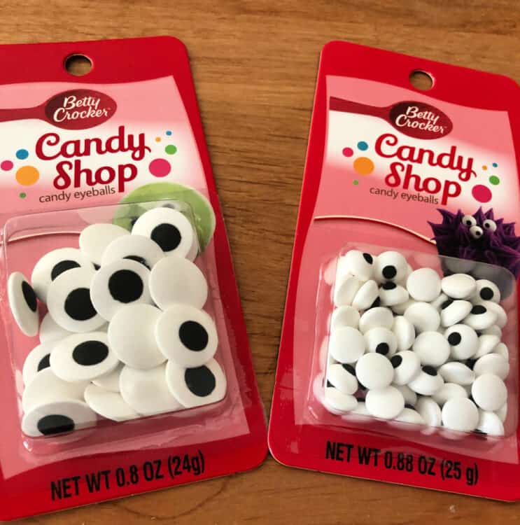 2 different size packages of candy eyes