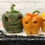 2 of the carved Jack O'Lantern peppers