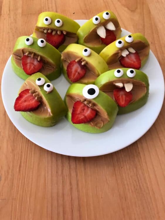 group of silly apple bites on a white plate