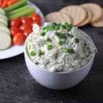 jalapeno artichoke dip in a white bowl