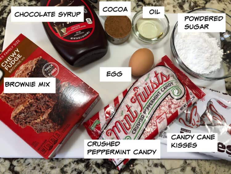 ingredients: brownie mix, chocolate syrup, cocoa, oil, egg, powdered sugar, candy cane kisses and crushed candy