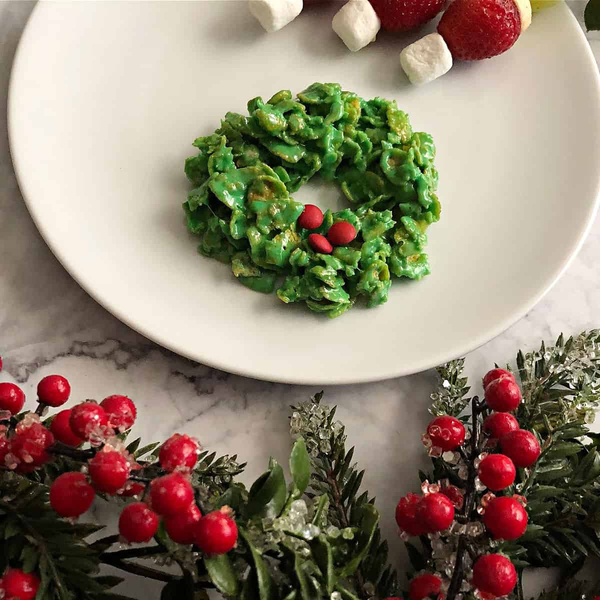 cornflake marshmallow cookie wreath on a white plate.