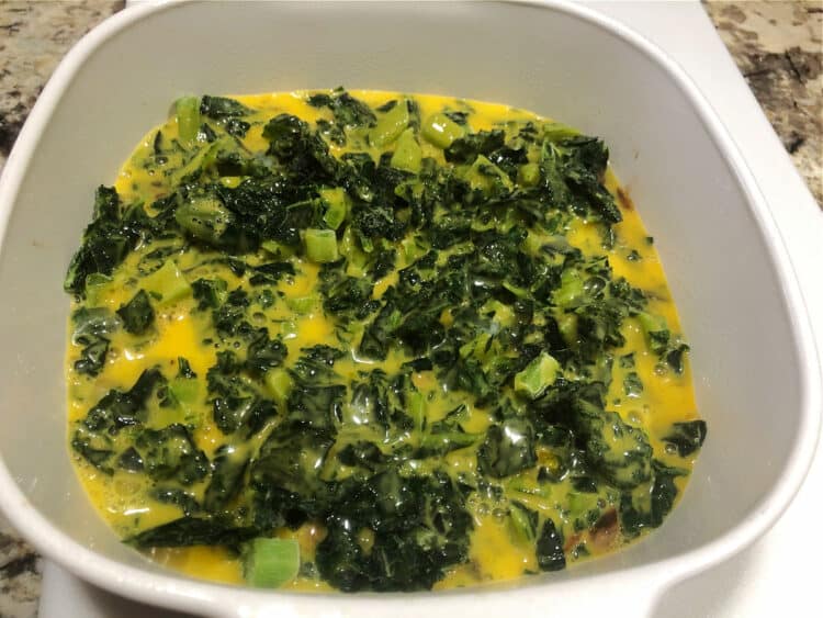 spinach and eggs added to dish