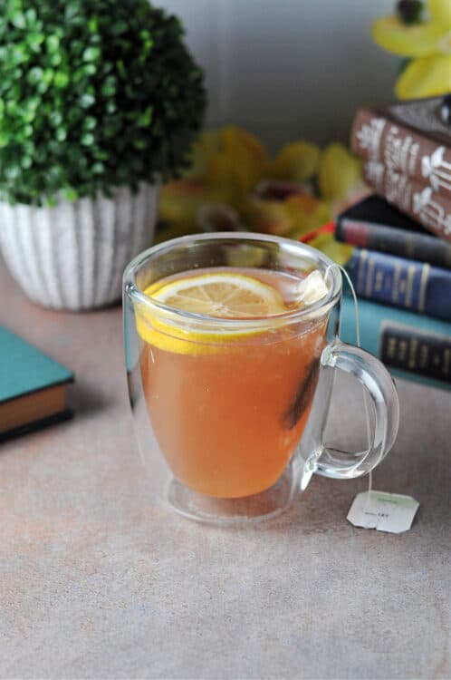 copycat starbucks medicine ball or bomb tea surrounded by books and a plant