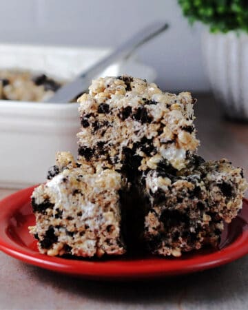 Oreo or cookies and cream rice krispies on a red plate.