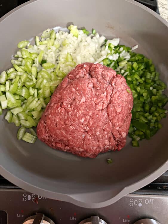 ground beef and veggies added to skillet