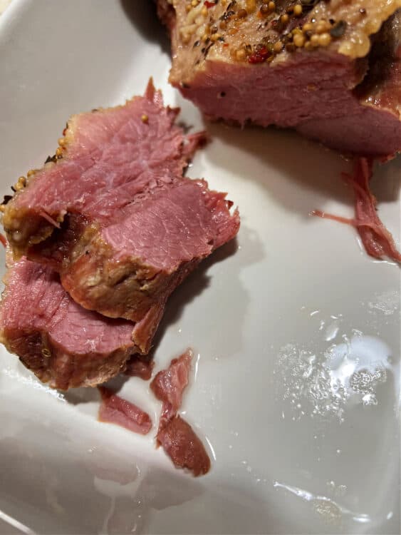 2 slices of Instant Pot cooked corned beef cooked with no cabbage.