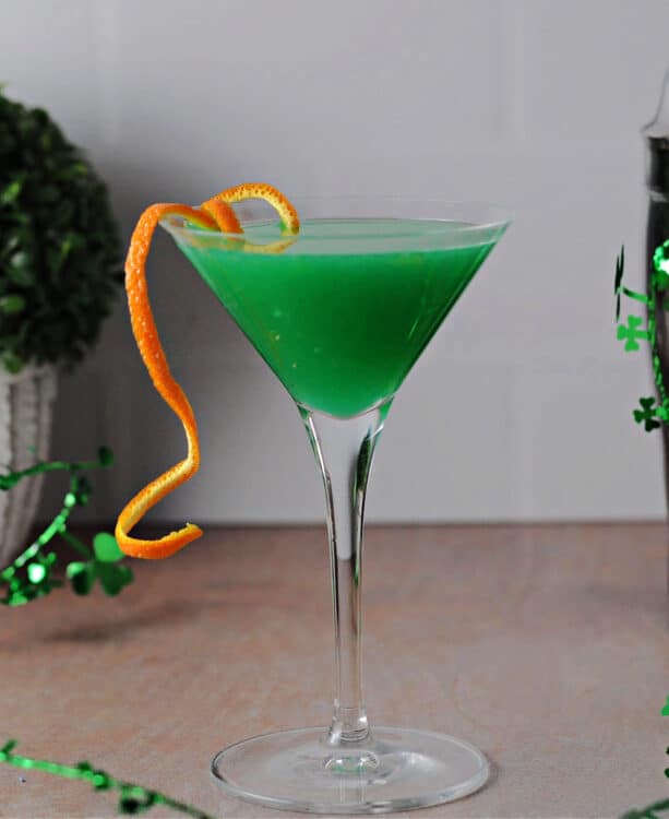 green cocktail in a martini glass - AKA shamrock martini.