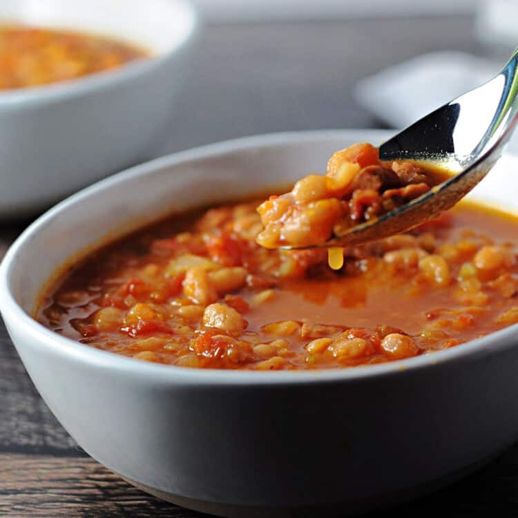 spoon of navy bean with ham soup