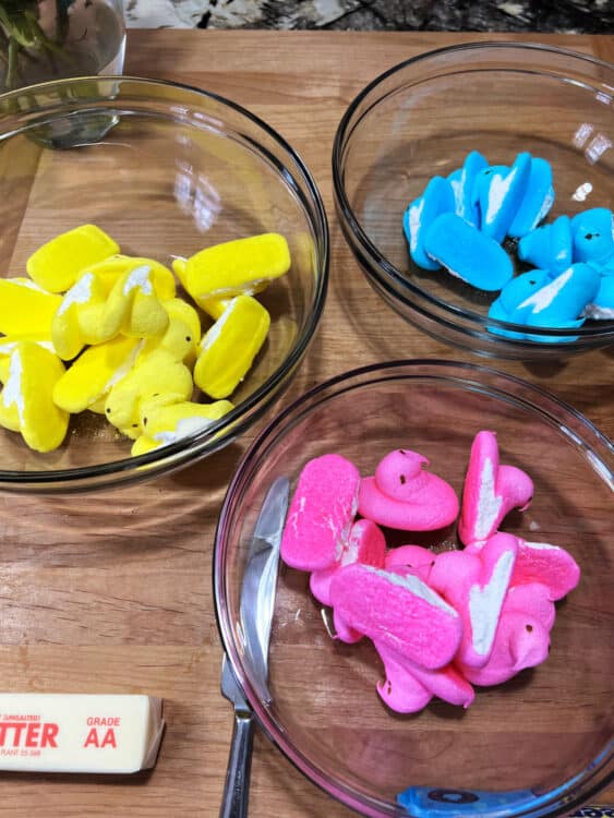 peeps in 3 separate bowls, by color.