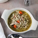 bowl of chicken and barley soup.