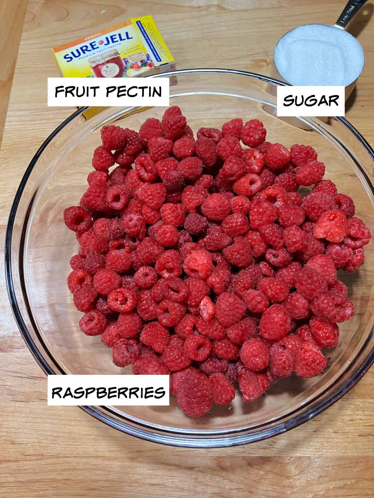 raspberries, sugar and pectin ingredients.