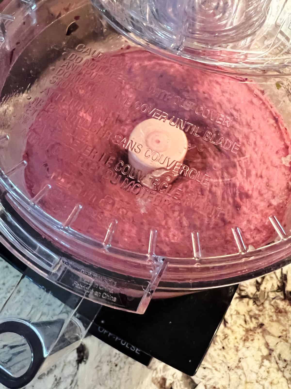 Blueberry Nice cream in a food processor.