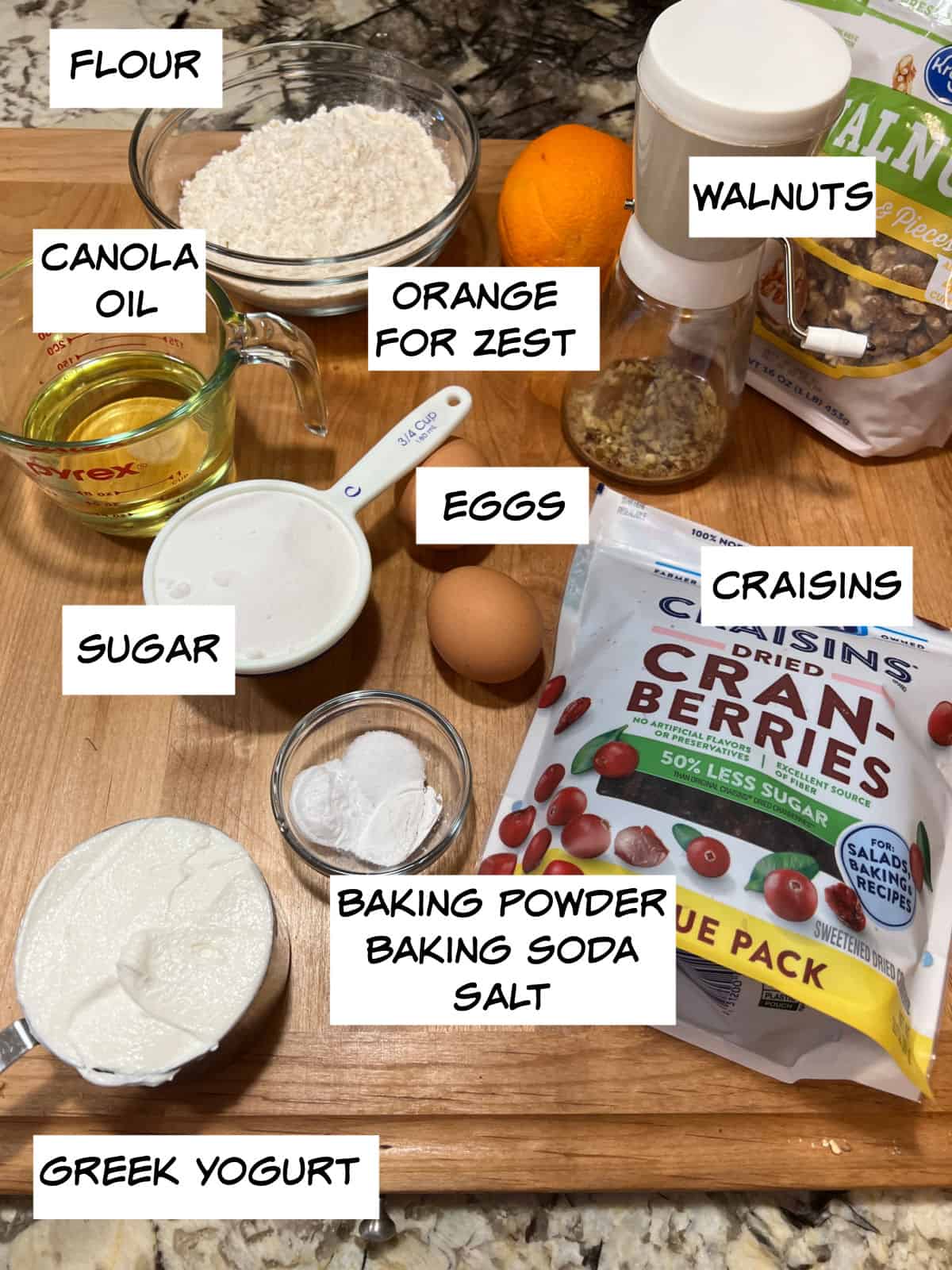 ingredients: flour, oil, walnuts, orange, ceggs, sugar, greek yoguert, baking powder, baking soda, and salt.raisins, 