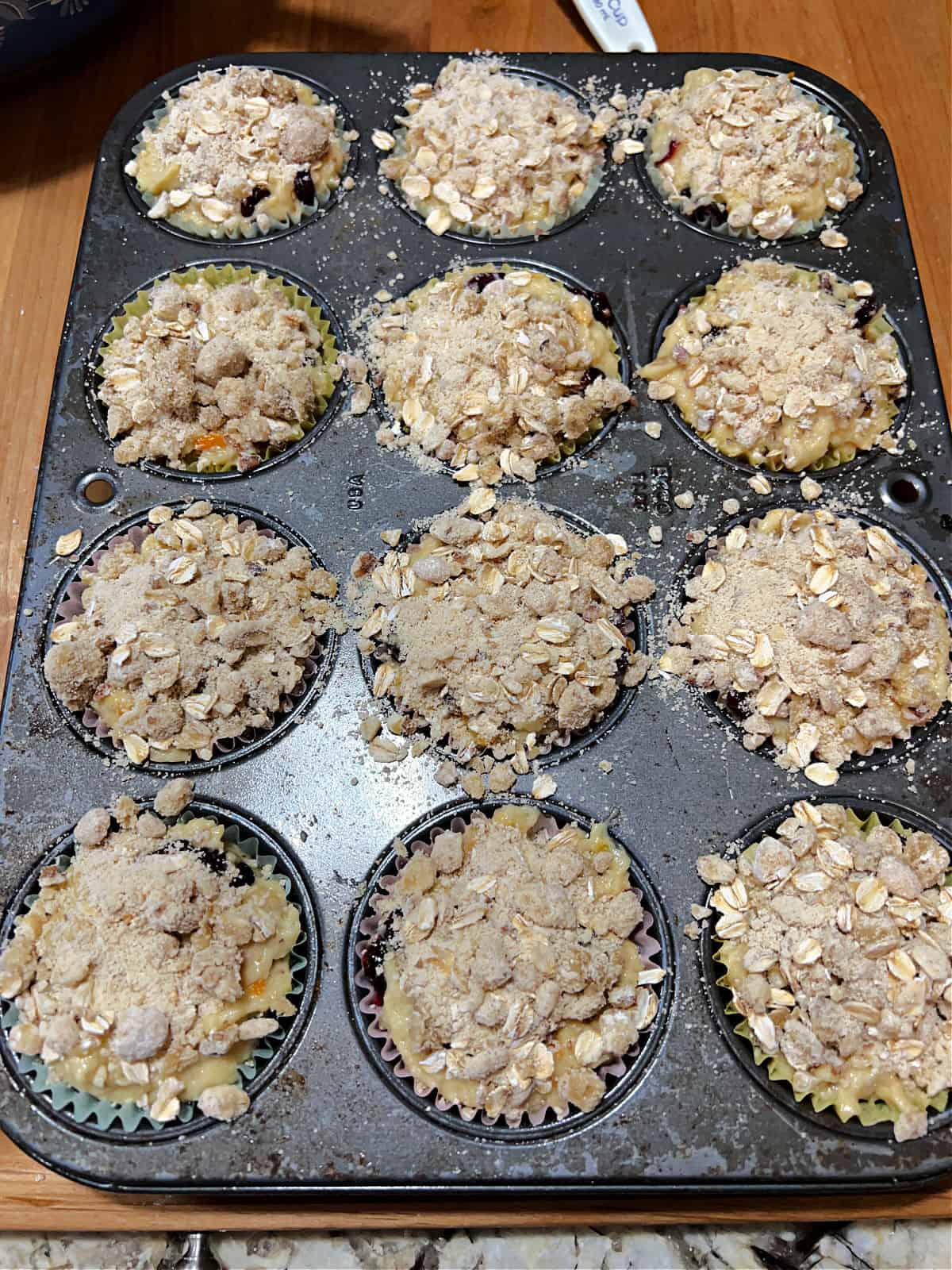 batter in cups topped with streusel.