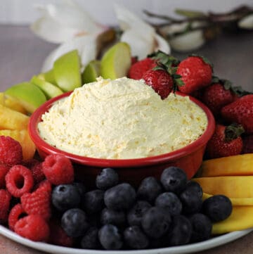 Cool Whip 2 ingredient Fruit Dip surrounded by fruit.